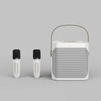 Bærbart karaoke højttalersystem med 360° lyd og to trådløse mikrofoner – ideelt til fester både indendørs og udendørs