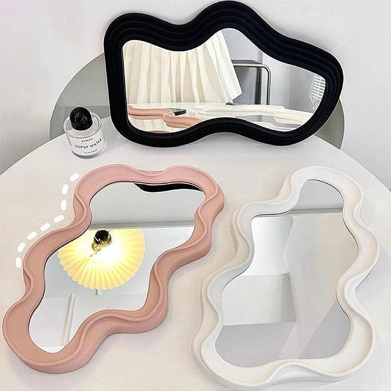 Spejl med himmelinspireret design